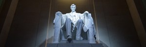 Who should be memorialized with a statue in America?
